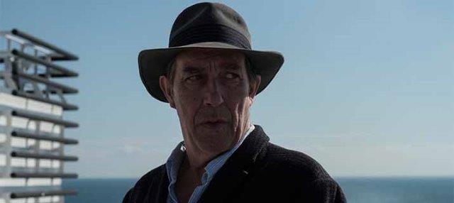 Review: ‘The Man In The Hat’Ciarán Hinds Charms In A “Silent” Road Trip Comedy That's Tough To Define